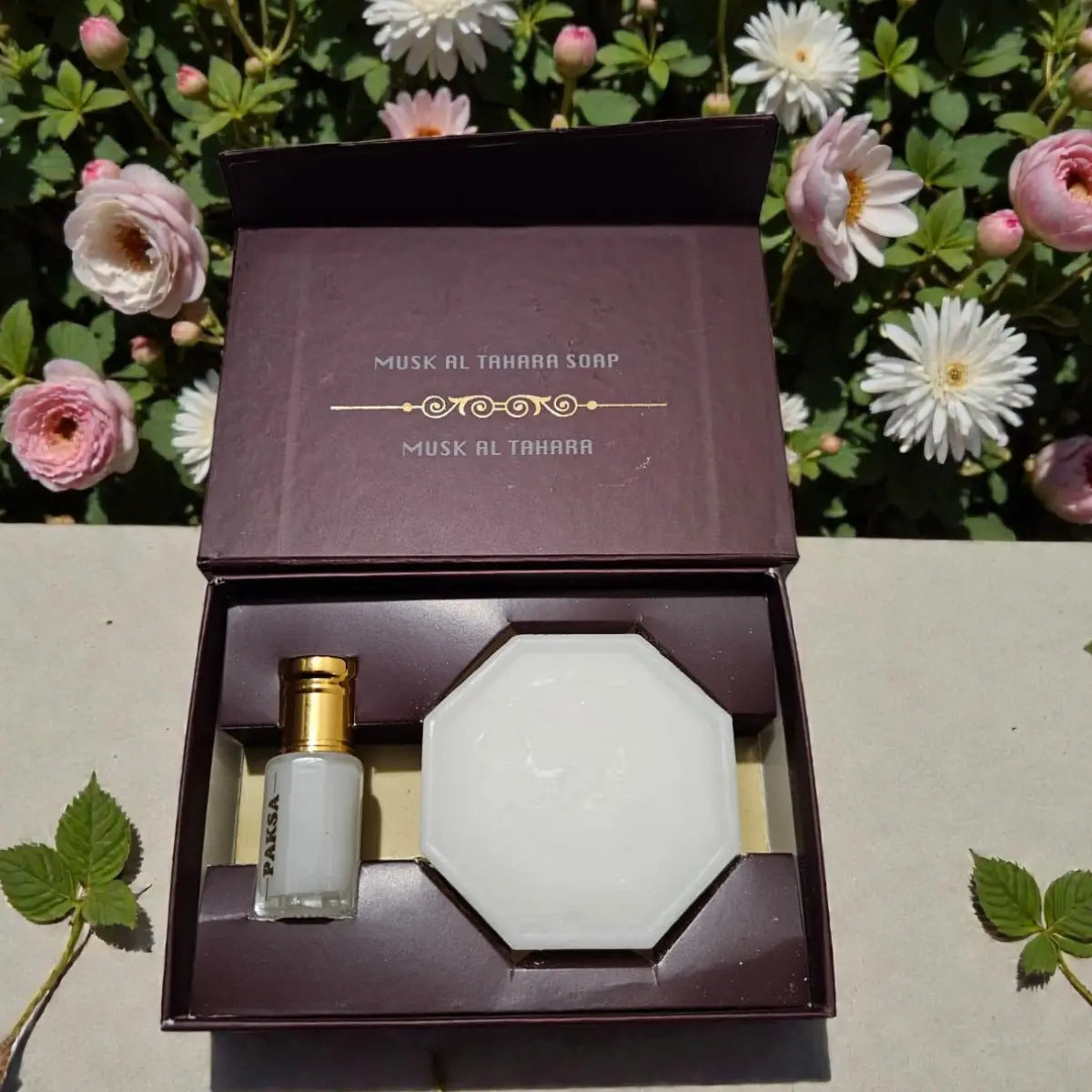 The mini lotion bottle with tahara musk fragrance included in the Paksa Misk Al Tahara set